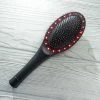 Hot Sale 🔥 Light and Massage Therapy Hair Brush by Headwaters, Inc. 👏
